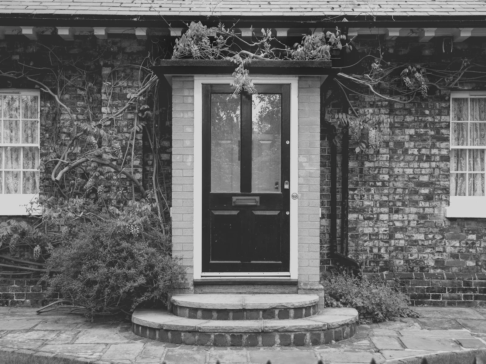Black and white British front door, placeholder until Adrian's portrait is added